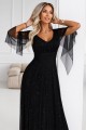 Długa połyskująca w świetle suknia z dekoltem i transparentnym rękawkiem - czarna