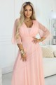 Długa połyskująca sukienka plus size z dekoltem i transparentnym rękawkiem - brzoskwiniowa